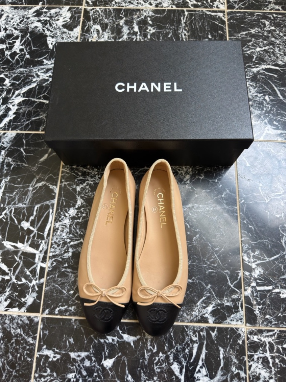 CHANEL Beige and Black Cap-Toe Leather Ballet Flats